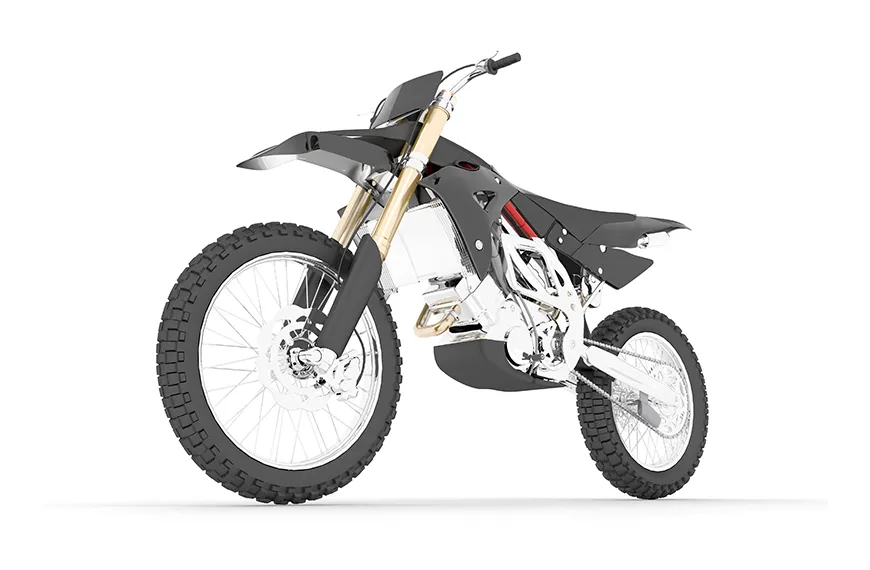 Off-road motorcycle featuring front suspension forks optimized with lubricating anodizing for superior performance.
