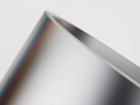 Close-up of aluminum treated with Oxalic Acid Anodizing showing a smooth iridescent finish and high corrosion resistance.